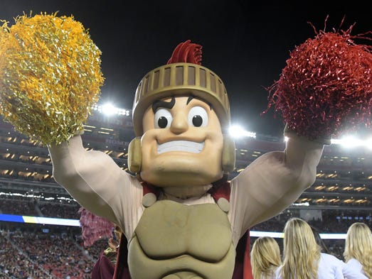 Southern California Trojans mascot Tommy Trojan reacts