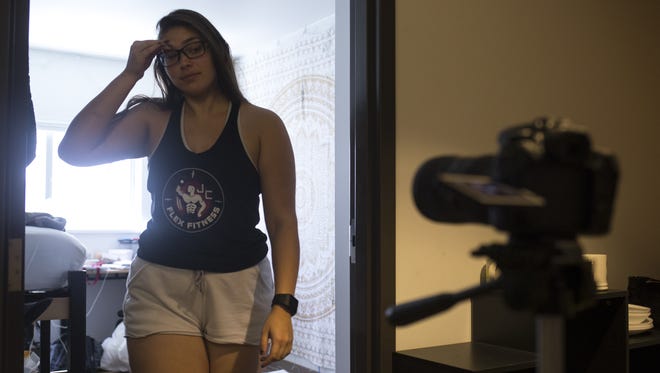 Sidney Aronsohn films her morning routine in her ASU dorm room for her YouTube channel.