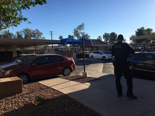 The apartment-complex parking lot in Tempe where two