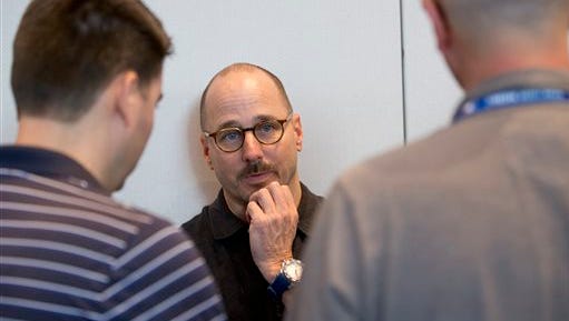 New York Yankees general manager Brian Cashman listens to questions from members of the media after baseball general managers meetings, Tuesday, Nov. 10, 2015, in Boca Raton, Fla. (AP Photo/Wilfredo Lee)