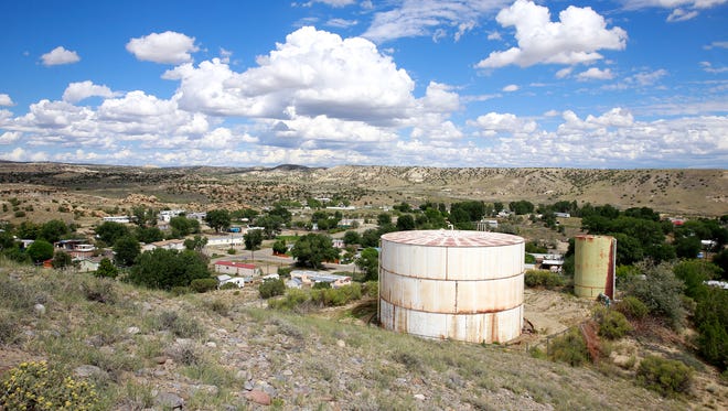 A water tank on Sept. 2 sits above the Harvest Gold subdivision east of Bloomfield.