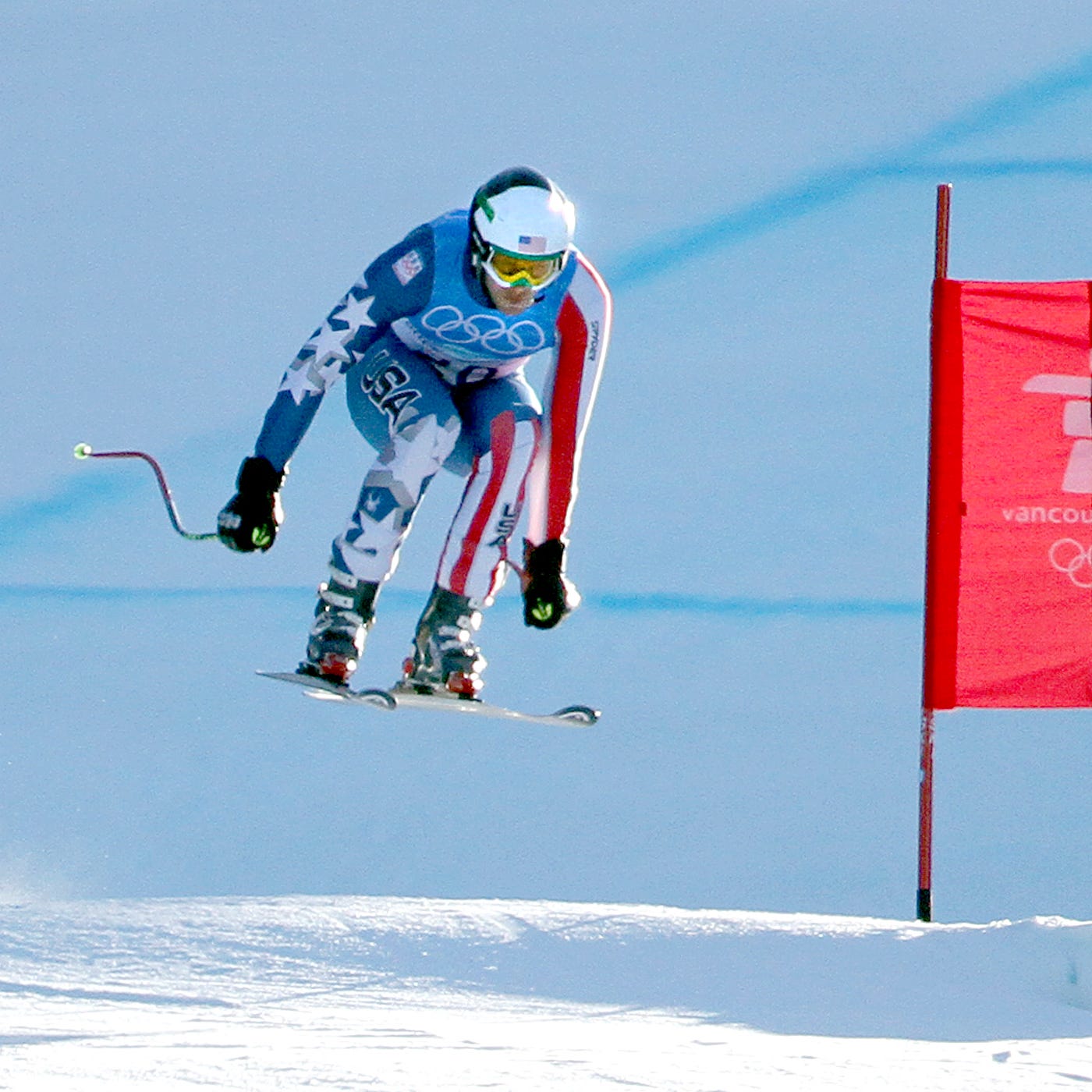 Bode Miller clears the final jump during the downhill portion of the men's super-combined on Feb. 21, 2010 in Whistler, BC on his way to winning the gold medal.