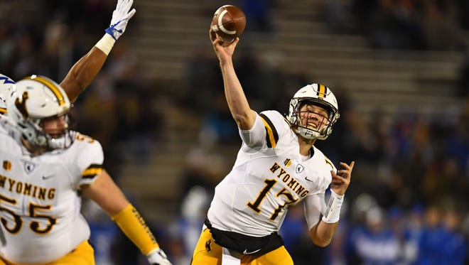 Wyoming quarterback Josh Allen, projected as the No. 1 pick in the NFL draft by ESPN analyst Mel Kiper Jr., throws a pass during a Nov. 11 game at Air Force.