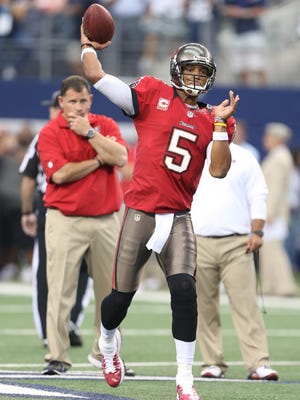Tampa Bay Buccaneers head coach Greg Schiano and then-Bucs QB Josh Freeman in September 2012. The NFLPA wants Schiano questioned about leaking private info on Freeman.