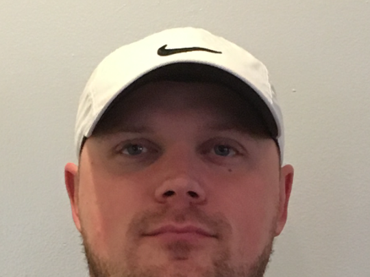 After serving on the North Arlington football staff
