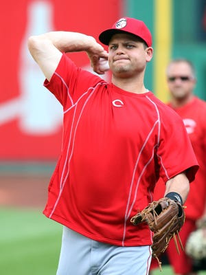 Reds catcher Devin Mesoraco throws on the field before Wednesday's game against the Pittsburgh Pirates at PNC Park.