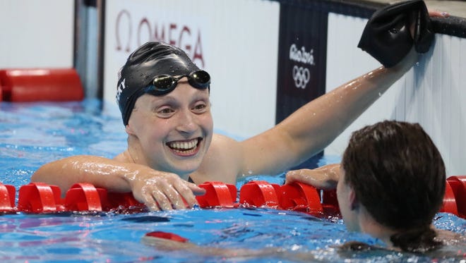 Katie Ledecky (USA) celebrates after winning the women's 400m freestyle final in the Rio 2016 Summer Olympic Games at Olympic Aquatics Stadium.