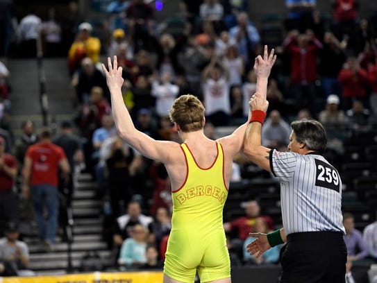 Bergen Catholic's Shane Griffith holds up three fingers