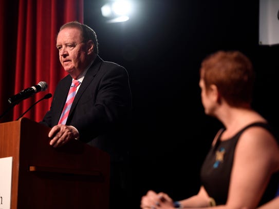 Former New Jersey Governor Richard Codey, left, holds