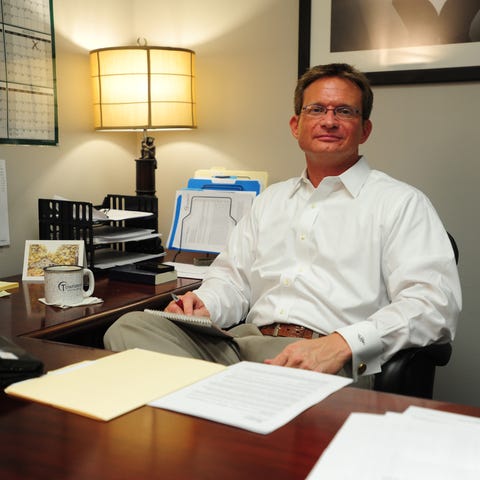 Michael Handley is seen in his Lafayette office in