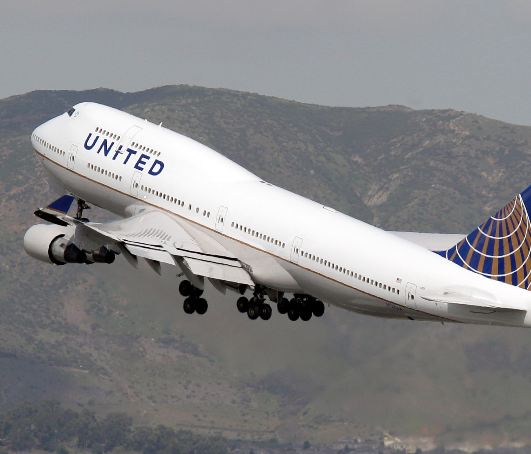 United Airlines 747-400, the first Boeing 747 entering service in the new United livery, takes off for South Korea from San Francisco International Airport on Feb. 23, 2011.