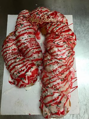 Rickey Meche's candy cane king cake makes the perfect holiday treat. The $12 king cake feeds eight to 10 people.