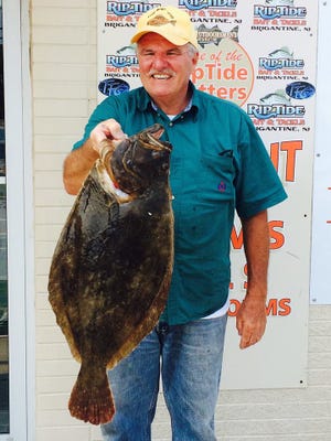 John Monte with a 9 lb 10 oz flounder measuring in at 28.5" caught in Absecon channel with a buck tail and a minnow.