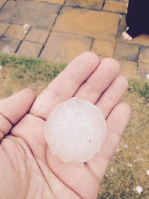 It's not a golf ball, it's hail, which fell in a violent storm Saturday off of Roadrunner Parkway, by Desert Hills Elementary.