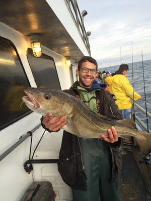 Scott Sablon from Jersey City, with a 17-pound cod caught offshore on the 125-foot Jamaica.