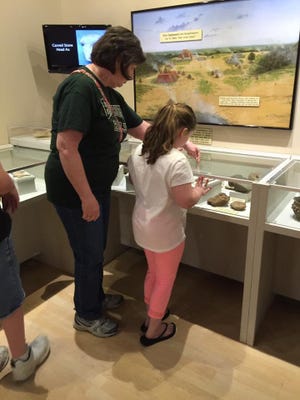 Visitors can learn about the Mississippian Era moundbuilders who inhabited the Shiloh area in the archaeology exhibit room.