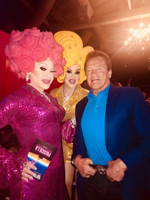(L to R) Alfie Pettit aka Arial Trampway, Ethylina Canne and former state governor and movie star Arnold Schwarzenegger at Palm Canyon Theatre on Oct. 27, 2017.