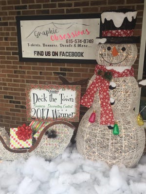 Graphic Obsessions won first place in Portland Chamber of Commerce's "Deck the Town" business decorating contest.