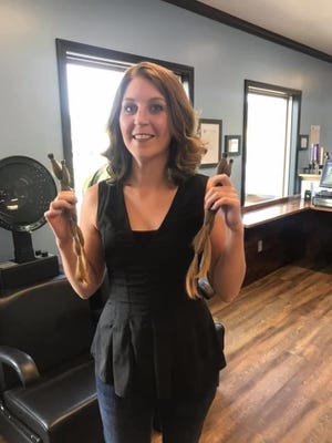 Lock 7 Hair Studio owner Heather Jones donated her own tresses as part of last year's Wigs for Kids fundraiser.