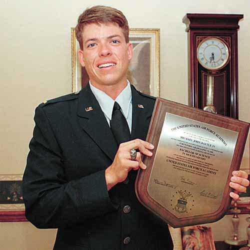 Michael Battle IV proudly displays the plaque he received upon graduating the Air Force Academy. On his right hand is his Air Force Academy ring, which he received at the end of his junior year.