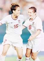 United States Tisha Venturini, left, who scored two goals, and Shannon McMillan, who scored the third goal, celebrate after Venturini scored her second goal against North Korea during their Women's World Cup football match at Foxboro Stadium in Foxboro, Mass., Sunday June 27, 1999. USA won 3-0.