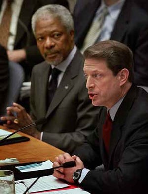 Democratic presidential candidate Vice President Al Gore sits next to U.N. Secretary General Kofi Annan as he addresses the United Nations Security Council Monday. Gore announced a new $150 million initiative to combat the spread of AIDS and contribute to the international infectious disease prevention efforts.