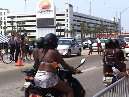 Police take up positions in the middle of route A1A in Daytona Beach Saturday to keep the traffic moving during the Black College Reunion. Traffic in the area has been rerouted to enable the visitors to the city to mov
