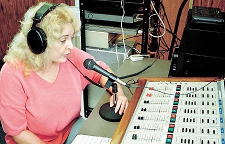 Disc Jockey Regina Amos broadcasting mid-days on WIPC in Lake Wales is back on the air after a fire destroyed their studios.