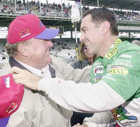 A.J. Foyt congratulates Eliseo Salazar after Salazar qualified on the front row for the Indy 500.