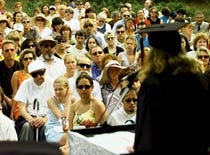 Provincetown Class of 2000 salutatorian April Schmidt addresses the crowd at yesterday's graduation ceremonies, held at the Provincelands Visitors Center amphitheater.