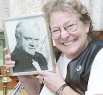 Donna Walcovy of Mashpee hugs an autographed photo of James Cagney. Walcovy has been a huge fan of Cagney?s ever since seeing the actor in the 1942 film "Yankee Doodle Dandy."