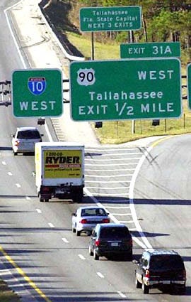 A motorcade containing a rental truck carrying some 460,000 election ballots from Palm Beach County arrives in Tallahassee Thursday.