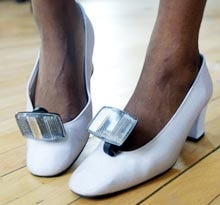 Brazilian designer Geove souped up a pair of shoes with automobile reflectors for Sunday's Fashion in Focus show.