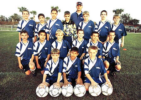 The Winter Haven Kicks Under-12 boys soccer team recently won the Region C  Division 4 championship. Members of the team in the front row, from left, are Michael Shetler, Marco Gonzalez and Sean Worden. In the second row, from left, are Nathan Osbourne, Tim Lahaie, Joey Workman, John Rounds and Kyle Sample. In the third row, from left, are Chris Templeton, John-Michael Forman, Ryan Minter, Josh Gardner, Calder Wilson, Evan Griffith and Kyle Milburn. In the back is Kicks coach Ed Gardner.
