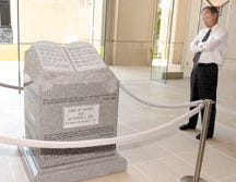 Pate DeBardeleben views a monument to the Ten Commandments unveiled in the Alabama Supreme Court Building in Montgomery Wednesday. The granite monument weighs 5,280 pounds and is displayed in the Supreme Court rotunda.