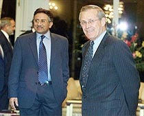 "The Taliban are not really functioning as a government," Defense Secretary Donald Rumsfeld said after meeting with Pakistani President Pervez Musharraf, left.