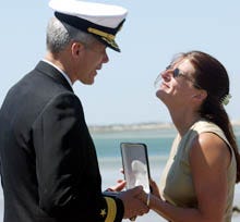 "This is truly a Brian kind of day," said Julie Sweeney at Millway Beach in Barnstable yesterday as she accepted the Defense of Freedom medal from Rear Adm. James Godwin. Sweeney's husband, Brian, was on United Airlines Flight 175.
