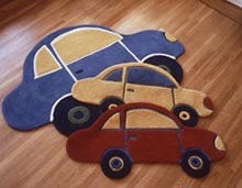 Classic car shapes - like those a child would draw - are translated into rugs.
