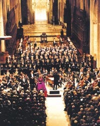 London's Royal Choral Society performs at the Peterborough Cathedral in England. The group will appear this weekend with the Cape Symphony Orchestra.