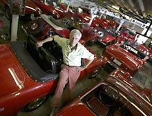 Bill Putman keeps his collection of 54 classic and newer model sports cars in a barn behind his bed and breakfast.