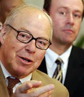 Even before U.N. weapons inspectors led by Hans Blix, left, arrive in Baghdad today, the Bush administration has taken steps to ensure military readiness in case of an attack on Iraq.