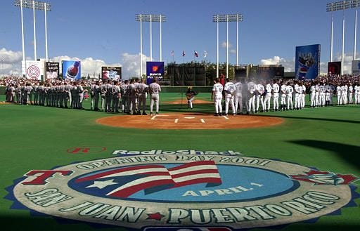 Entertainer Jose Feliciano performs the national anthem during the opening day baseball game between the Texas Rangers and Toronto Blue Jays at Hiram Bithorn Stadium in San Juan, Puerto Rico, in this April 1 photo. The Montreal Expos will play 22 of their 81 home games at Hiram Bithorn Stadium next year, Major League Baseball announced Wednesday.