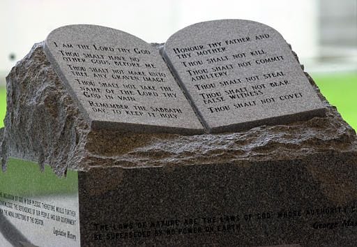 The 5,300 pound Ten Commandments monument on display at the State Judicial Building in Montgomery, Ala., as seen in this Nov. 19 photo. The controversial monument was placed there by Alabama Supreme Court Chief Justice Roy Moore. Moore said Tuesday he would appeal a ruling by U.S. District Judge Myron Thompson that said the monument was an establishment of religion at the building.