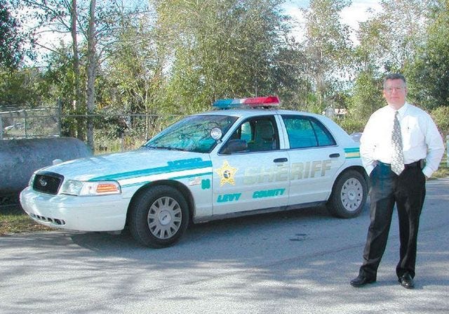 Levy sheriff suing automaker