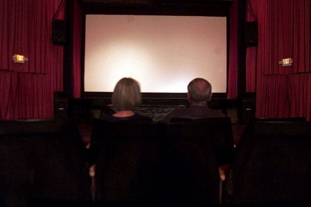 The screen and sound equipment at the Capri movie theater in Gaffney was recently updated. The husband and wife team of Clyde and Mary Hudson, below, are the owners of the Capri.
