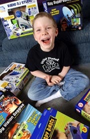 Forestdale kindergartener Dillon Laurino, 6, won 50 Wild Planet toys when the game he invented was picked among the 10 best in a national contest.