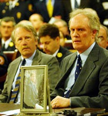 James Gahan of Falmouth, right, whose son Jimmy died in the Warwick, R.I., nightclub fire, testifies yesterday at the Statehouse as Rep. Eric Turkington, D-Falmouth, looks on.