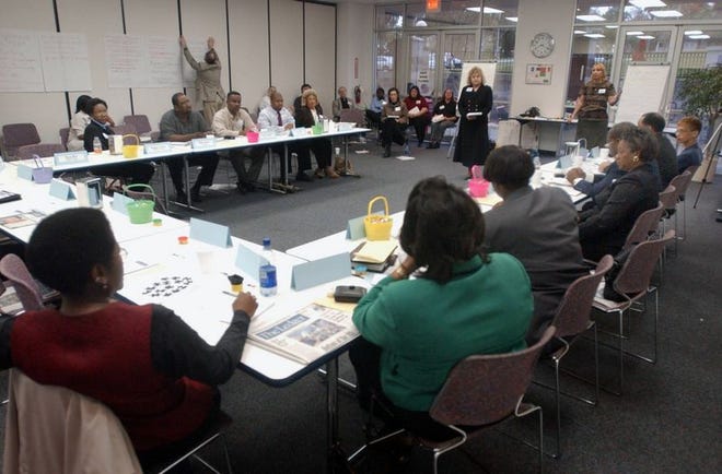 Facilitator Carolyn Jackson leads The Ledger's Credibility Roundtable. Many minority issues were discussed.