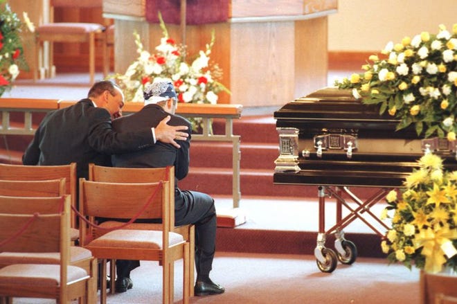 PETER COSGROVE/The Associated Press (1993)
Former Cleveland Indians pitcher Bob Ojeda is consoled by Strength Coach Fernando Montes as they await the funeral of Indians pitcher Tim Crews. Crews and Steve Olin were killed in a boating accident in 1993.