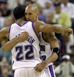 Doug Christie, right, and Jim Jackson helped Sacramento pull even with Dallas on Sunday night.